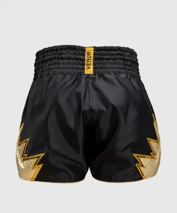 מכנס איגרוף תאילנדי Venum Inferno Muay Thai Shorts - Black/Gold