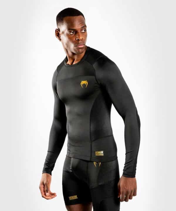 חולצת Venum G-Fit Rashguard - Long Sleeves שחור זהב