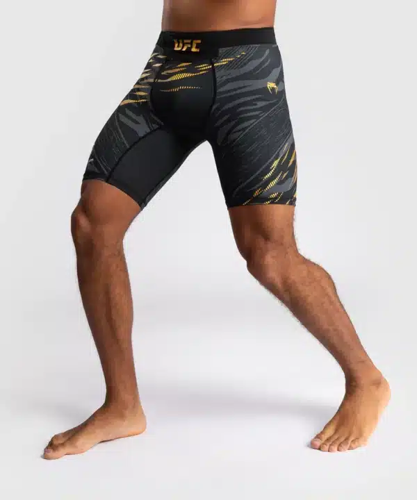 מכנס ונום UFC שחור -UFC Fusion by Venum Authentic Fight Night Men’s Vale Tudo Short - Champion