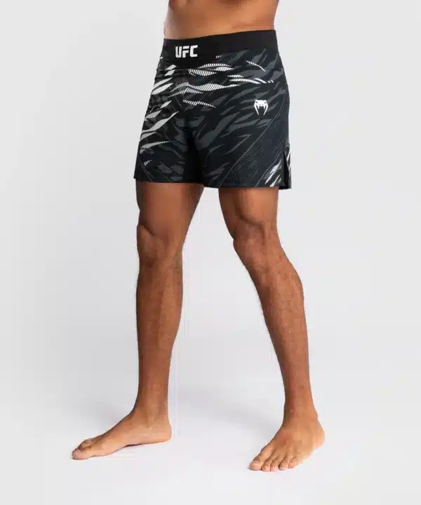 מכנס לחימה ונום UFC שחור- UFC Fusion by Venum Authentic Fight Night Men’s Fight Short - Short Fit - Black