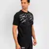 ⁦חולצת ונום UFC שחורה -UFC Fusion by Venum Men’s Replica Short Sleeve T-Shirt - Champion⁩ – תמונה ⁦2⁩