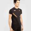 ⁦חולצה ונום UFC שחורה -UFC VENUM REPLICA MEN'S JERSEY - CHAMPION⁩ – תמונה ⁦4⁩