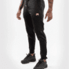 ⁦מכנס ונום UFC שחור-UFC VENUM AUTHENTIC FIGHT NIGHT MEN'S WALKOUT PANT - CHAMPION⁩ – תמונה ⁦2⁩
