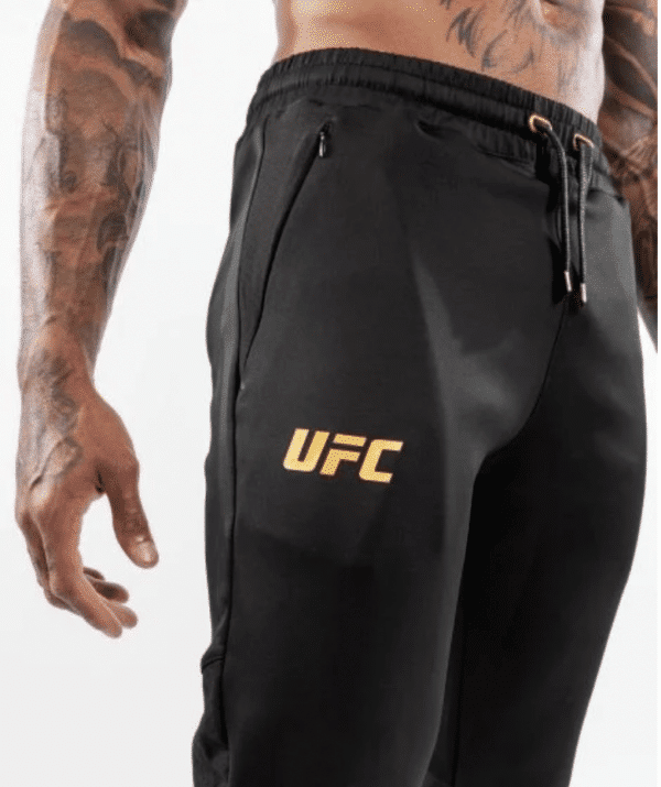 מכנס ונום UFC שחור-UFC VENUM AUTHENTIC FIGHT NIGHT MEN'S WALKOUT PANT - CHAMPION