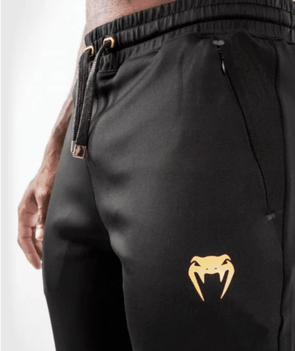 מכנס ונום UFC שחור-UFC VENUM AUTHENTIC FIGHT NIGHT MEN'S WALKOUT PANT - CHAMPION