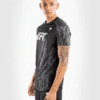 ⁦חולצת ונום UFC שחורה -UFC VENUM AUTHENTIC FIGHT WEEK MEN'S PERFORMANCE SHORT SLEEVE T-SHIRT - BLACK⁩ – תמונה ⁦3⁩