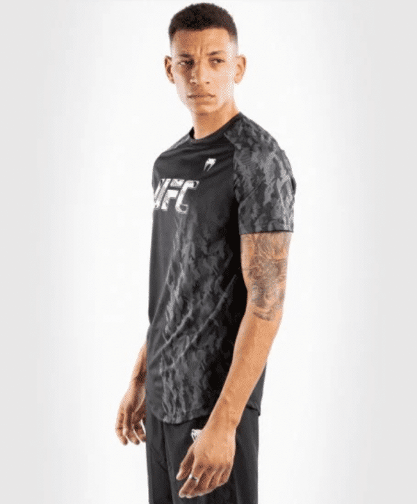 חולצת ונום UFC שחורה -UFC VENUM AUTHENTIC FIGHT WEEK MEN'S PERFORMANCE SHORT SLEEVE T-SHIRT - BLACK