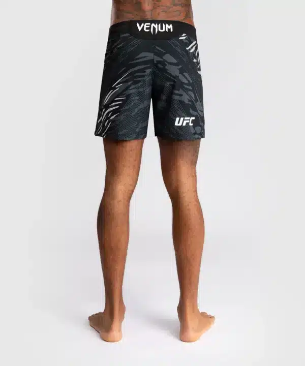 מכנס לחימה ונום UFC שחור- UFC Fusion by Venum Authentic Fight Night Men’s Fight Short - Short Fit - Black