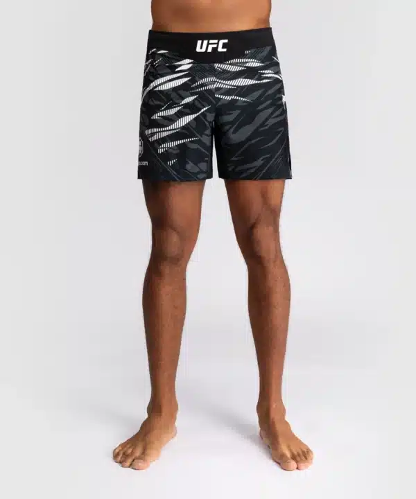 מכנס לחימה ונום UFC שחור- UFC Fusion by Venum Authentic Fight Night Men’s Fight Short - Short Fit - Black