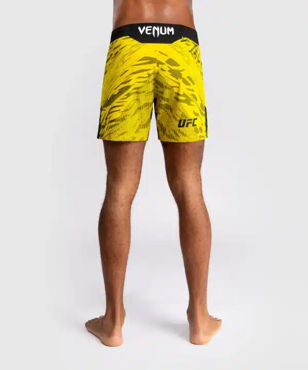 מכנס ונום UFC צהוב - UFC Fusion by Venum Authentic Fight Night Men’s Fight Short - Short Fit - Yellow