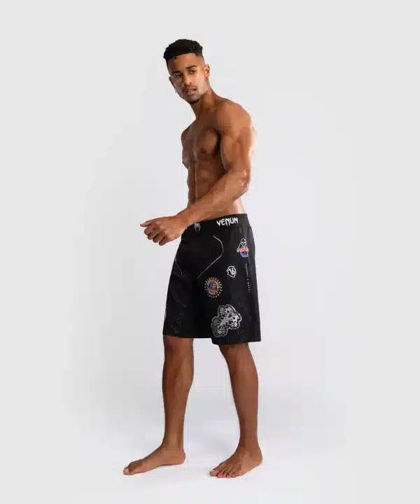 מיכנס לחימה של ונום - Venum x Tekken 8 - Paul Phoenix Fight Shorts - Black
