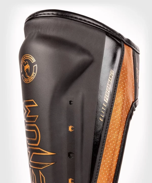 [Venum Elite Evo Shinguards] White/Black/Gold - מגני רגליים ונום אליט איבו בעיצוב חדש