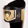 ⁦[Venum Elite Evo Shinguards] White/Black/Gold - מגני רגליים ונום אליט איבו בעיצוב חדש⁩ – תמונה ⁦3⁩