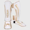 [Venum Elite Shinguards] White/Gold - מגני רגליים ונום אליט