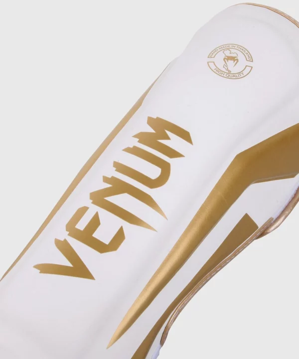 [Venum Elite Shinguards] White/Gold - מגני רגליים ונום אליט