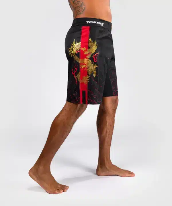 מכנס ונום שחור -Venum x Tekken 8 - Marshall Law Fight Shorts - Black/Red/Gold