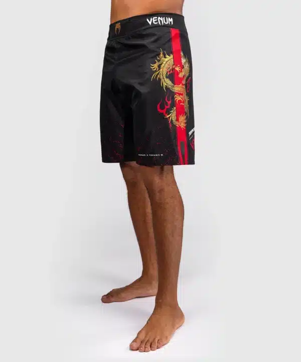 מכנס ונום שחור -Venum x Tekken 8 - Marshall Law Fight Shorts - Black/Red/Gold