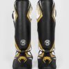 ⁦מגני רגליים ונום שחור זהב ולבן- VENUM CONTENDER 2.0 SHIN GUARDS - BLACK/WHITE/GOLD⁩ – תמונה ⁦4⁩