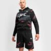 ⁦קפוצון ונום שחור/אדום -UFC VENUM AUTHENTIC FIGHT WEEK MEN’S 2.0 PULLOVER HOODIE - BLACK/RED⁩ – תמונה ⁦2⁩