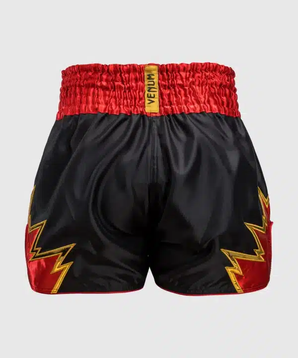 מכנס איגרוף תאילנדי Venum Inferno Muay Thai Shorts - Black/Gold/Red