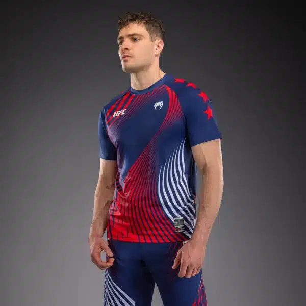 חולצת ונום דרייפיט UFC מקצועית כחולה מסדרת Official UFC Freedom 250